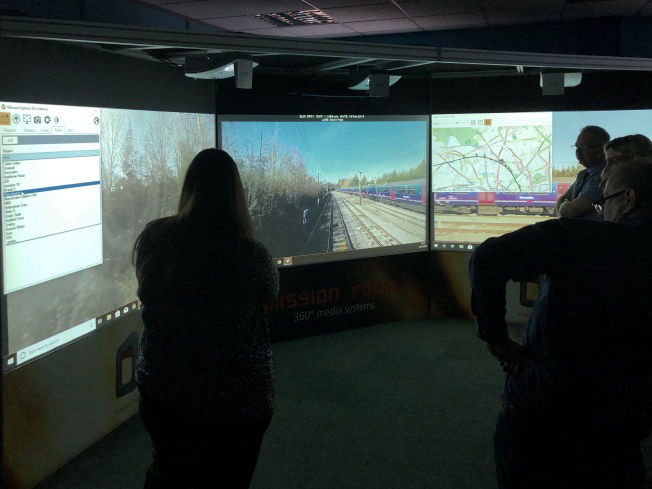 A group plans a rail operation using a Cine system and Mission Explorer software